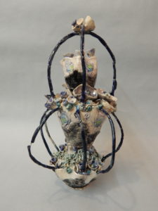 Bird in a basket Ceramic mixed media